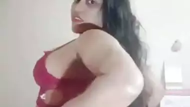 Big boob nude girl shows her butt and squeezes her boobs