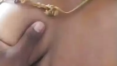 Stepson squeezes his stepmom’s big boob in nude MMS